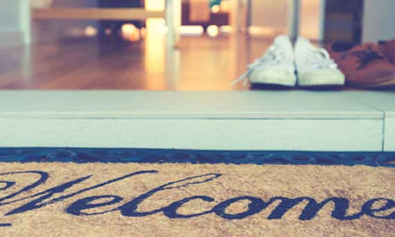 welcome mat in entryway of a home